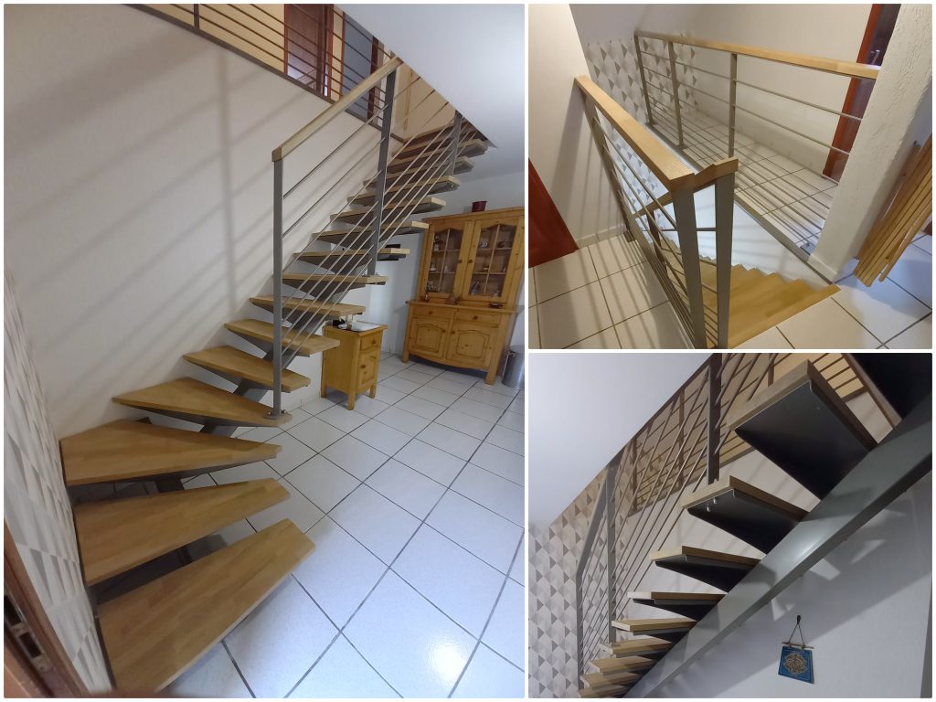Montage de l’escalier quart tournant à Domène : vue d’ensemble, garde-corps du palier et limon central avec marches en chêne.